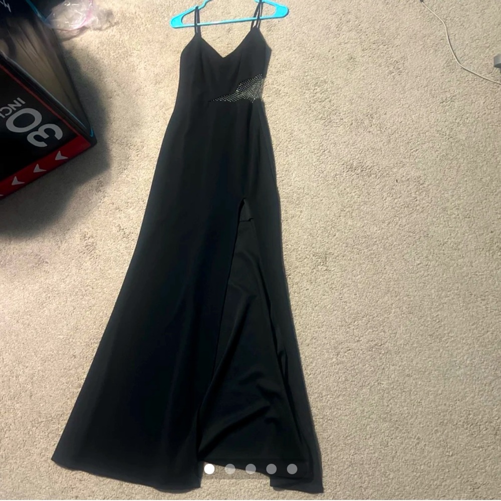 Long black slit dress with an opening around the stomach with sequence, formal